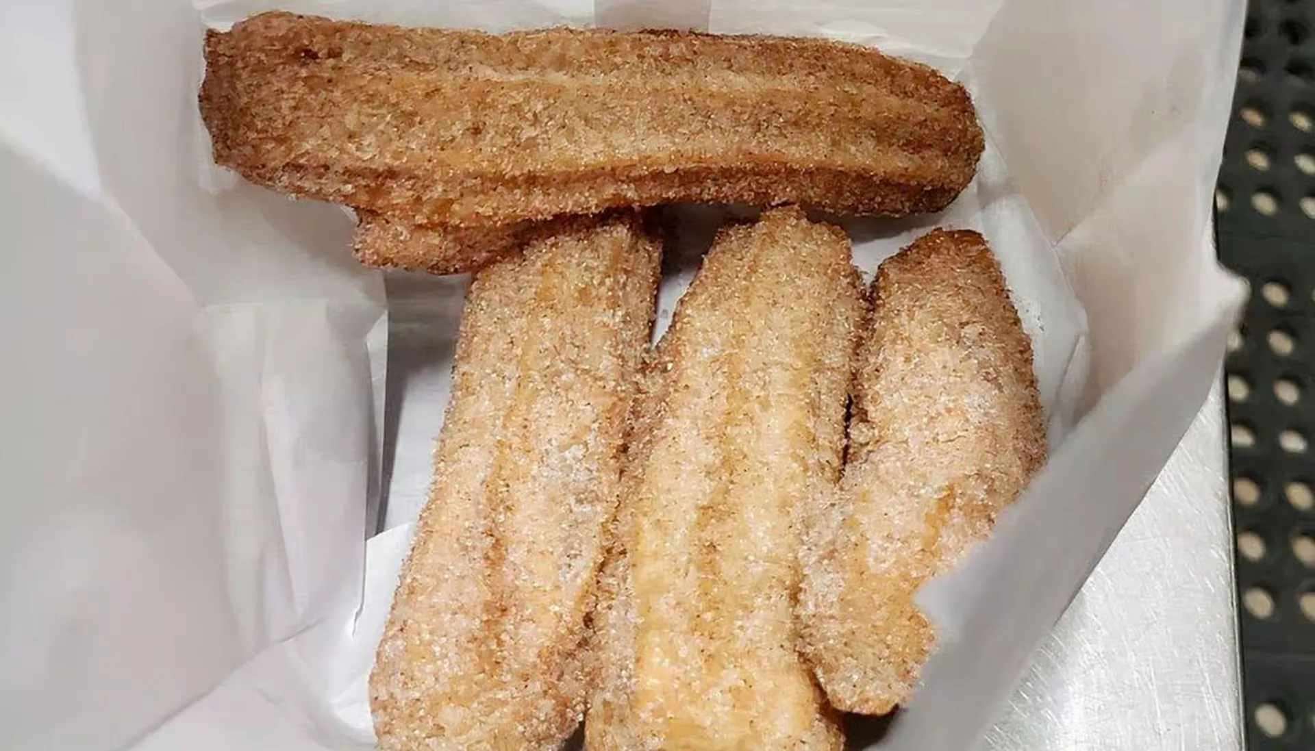 Freshly fried churros rolled in cinnamon sugar in Winnipeg, MB